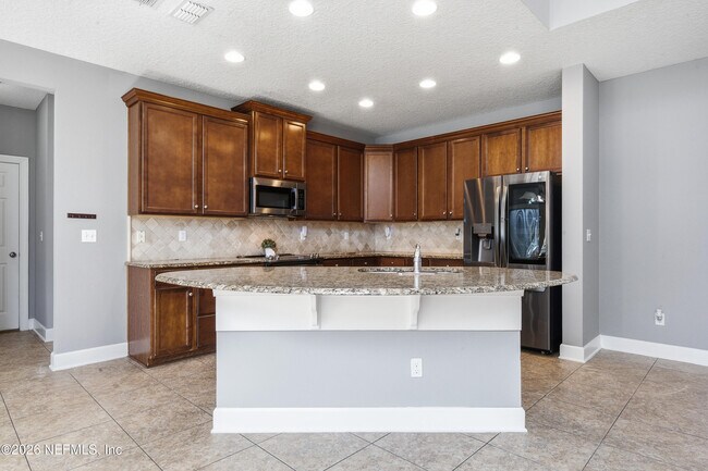 Building Photo - 4483 Plantation Oaks Blvd