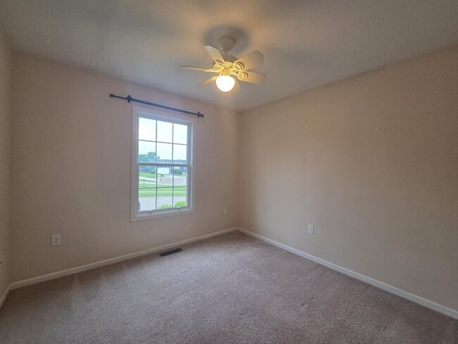 Building Photo - 601 Tall Grass Dr