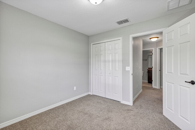 Building Photo - Freshly Painted 3BR Home with Spacious Yard, Modern Baths & No Deposit Option!