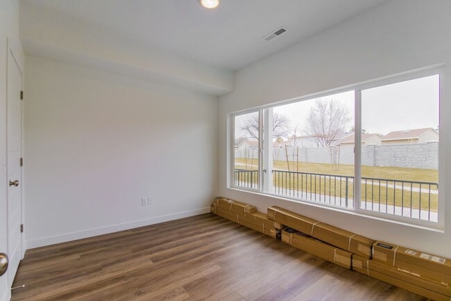 Building Photo - Amazing Modern three-story new build townhome!