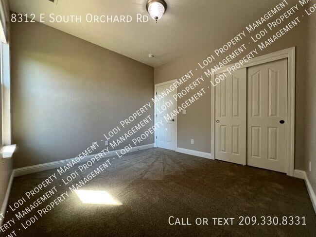 Building Photo - 8312 E Orchard Rd