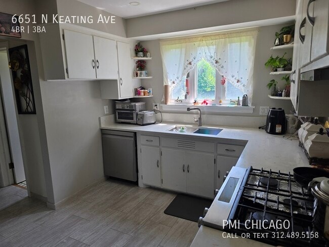 Building Photo - 6651 N Keating Ave