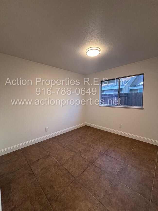 Building Photo - Action Properties RES Inc: offering Single Story, New Paint, Great Room with formal dining area, ...