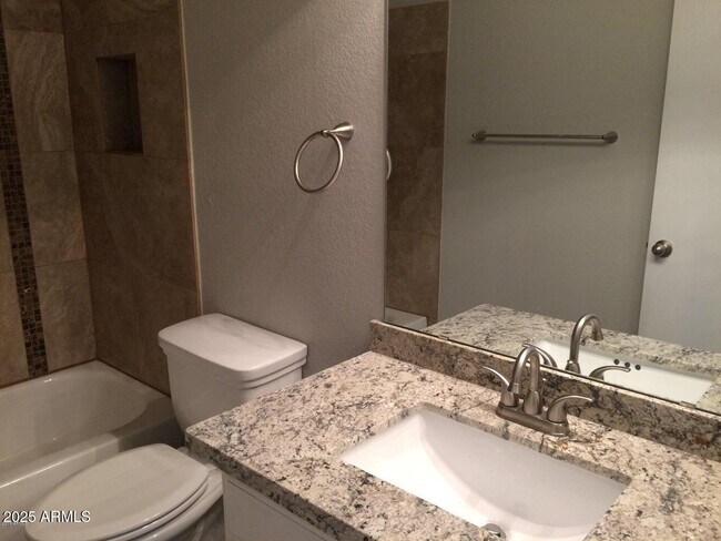 Building Photo - 2240 E Aire Libre Ave