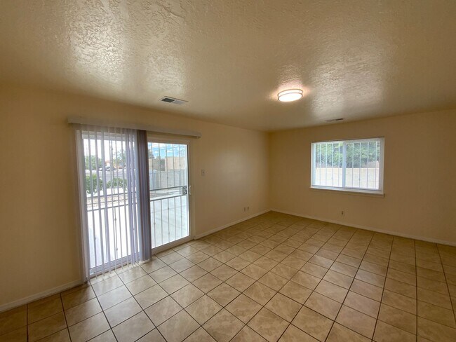 Building Photo - 4 Bedroom Single Story Home Available Near Tramway Blvd NE & Lomas Blvd NE!