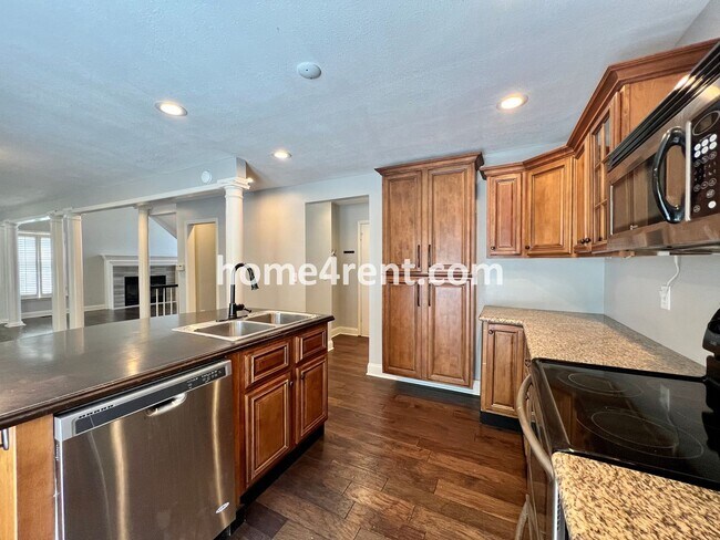 Building Photo - Fantastic Home in Blue Valley Schools w/ Hardwood Floors, Open Layout, Granite Counters, Finished...