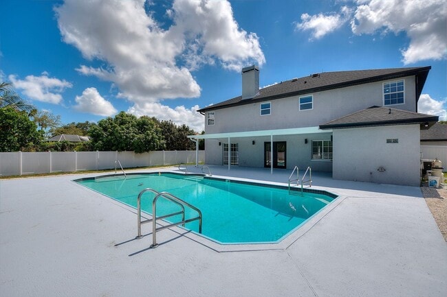 Building Photo - Rare Luxury Lease Opportunity | Spectacular 5-Bedroom Pool Estate on Nearly ¾ Acre Near Gulf Beaches