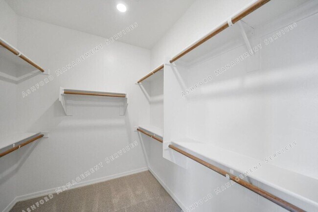 Building Photo - Luxury 3-Bedroom Townhome with Rooftop Dec...