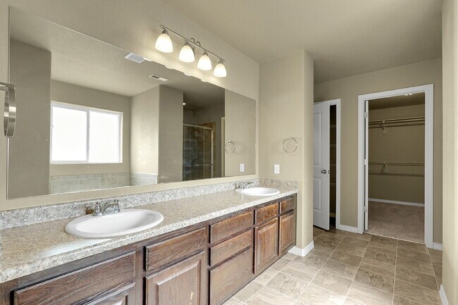 Building Photo - $2,490.95 - 4 Bed, 2.5 Bath Home in CO Springs with Fenced in Yard and 3 Car Garage!