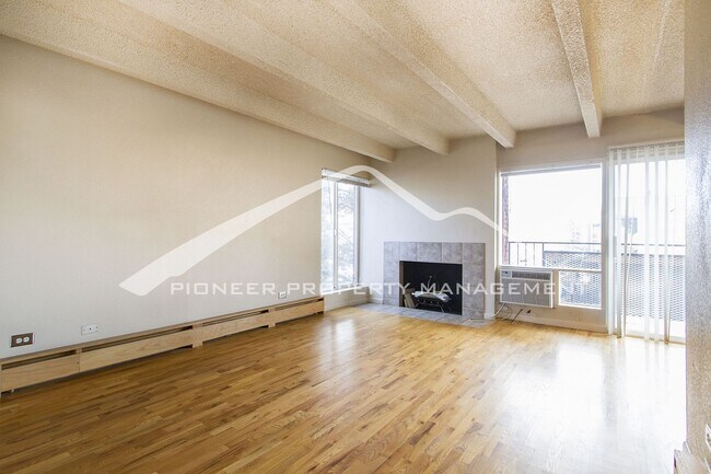 Building Photo - Cozy Condo with Assigned Parking Spot and Balcony