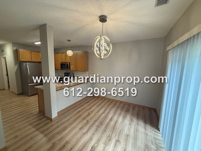 Building Photo - End Unit Townhouse Available Now, Loft Are...