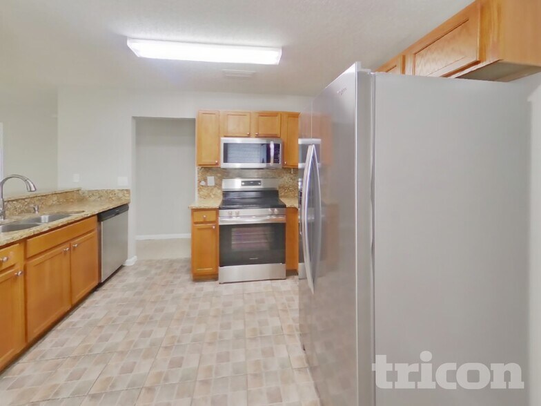 Building Photo - 7944 Cherry Blossom Dr S