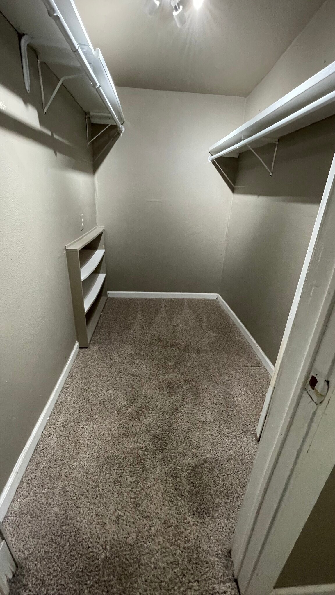 Walk-in closet. New carpeting will be installed before move-in date - 13947 Meadow Ln