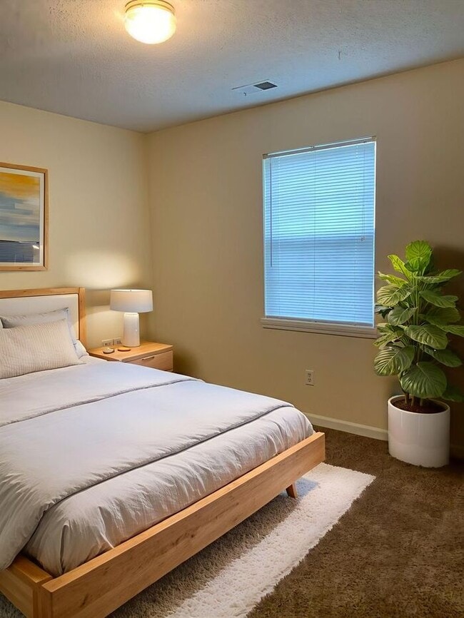 Building Photo - Welcome to Whispering Winds Townhomes – Wh...