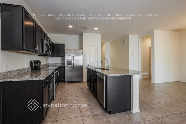 Building Photo - 37746 W Capri Ave