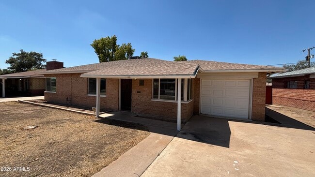 Building Photo - 5548 N 12th Ave
