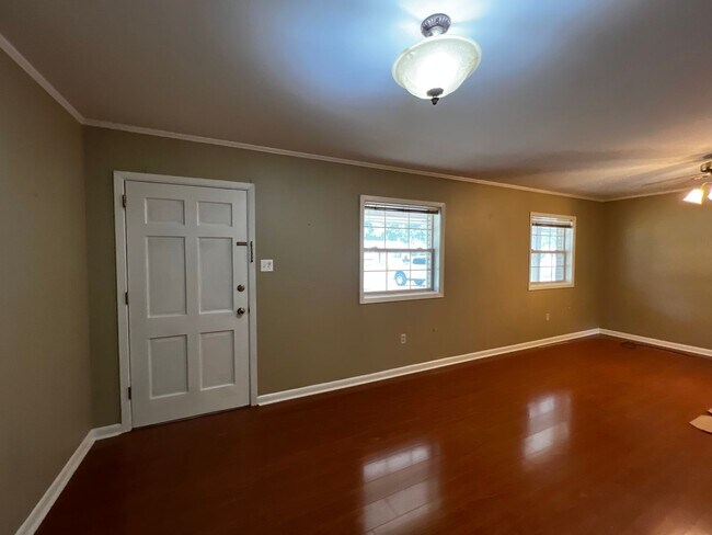 Building Photo - 3 Bedroom, 2 Bathroom, Brick home, Carport...