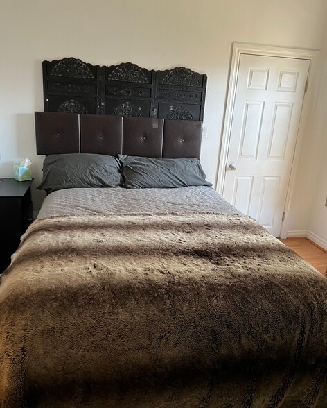 Large Bedroom includes a walk in closet - 607 N Garfield Ave