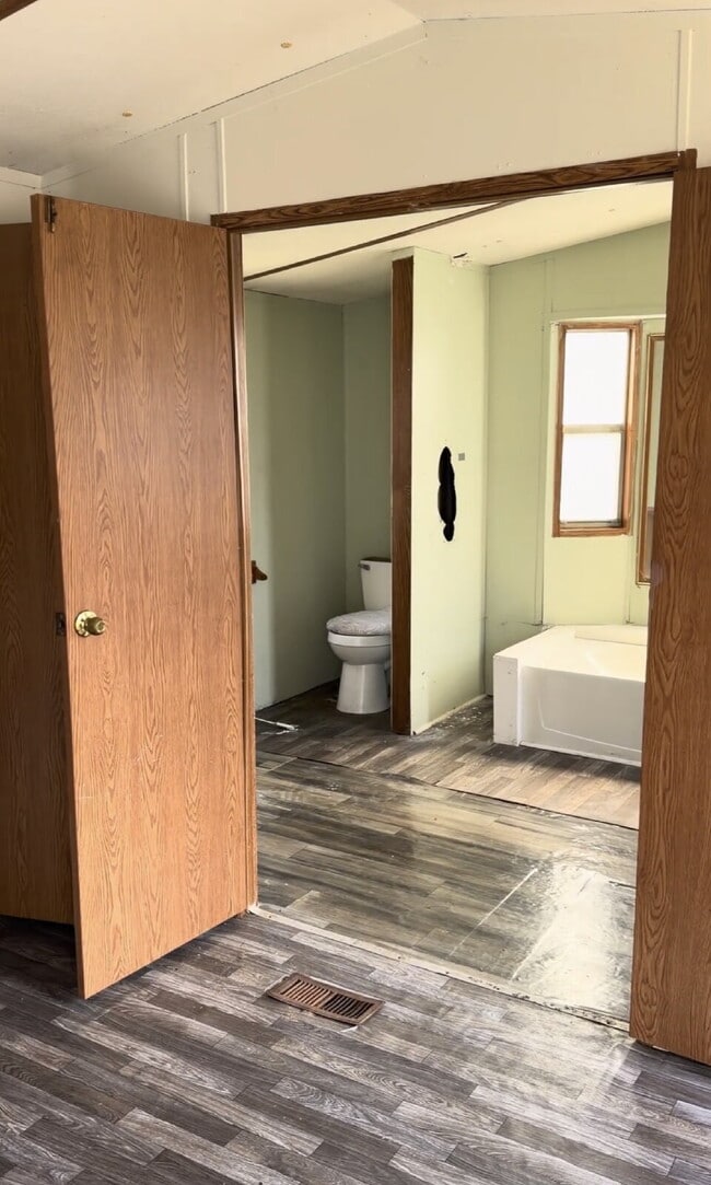 Building Photo - Handyman Special – Land + Home (Rent-to-Own)