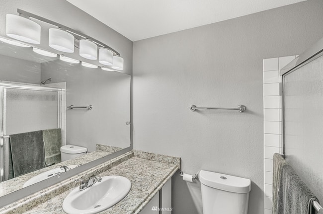 Building Photo - 2BR Condo w/ Vaulted Ceilings, W/D, Parking & Amenities | Utilities Included