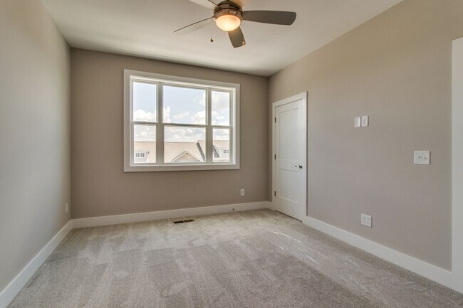Large windows for lots of natural light in master - 707 Vernon Ave