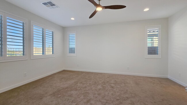 Building Photo - Pristine home in amenity rich Estrella Mountain Ranch!