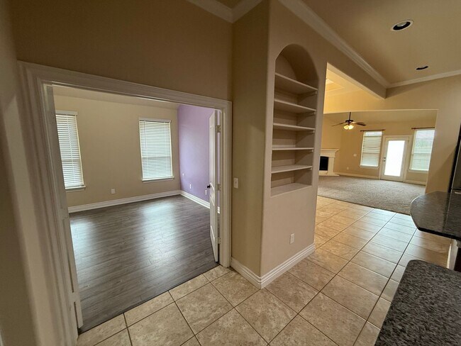 Building Photo - 3 bedroom + office  or 4th bedroom, storm shelter, neighborhood pond and walking track!