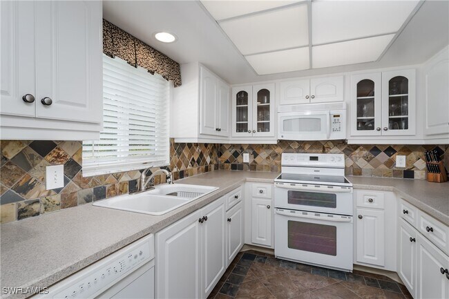 Building Photo - 4912 Tamiami Trl E