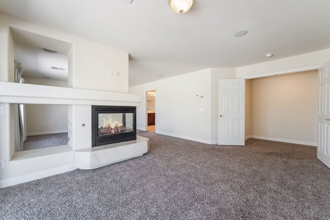 Building Photo - Beautiful Three Story, Five Bedroom Home with Lagoon Style Pool and Spa