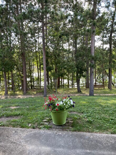 Out Patio Door with River Past Trees - 7 Juniper Trl