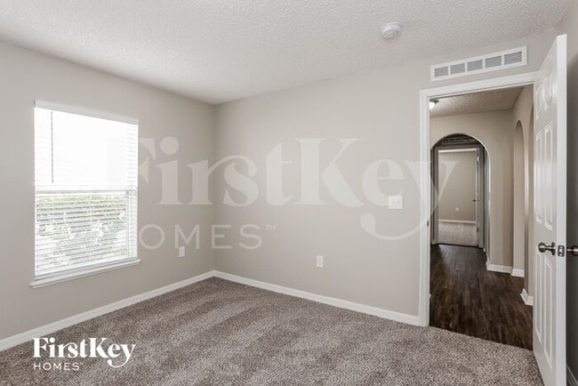 Building Photo - 6671 Gentle Oaks Dr N