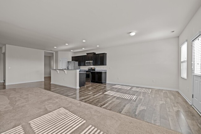 Building Photo - Spacious 5 Bedroom Home with 2-Car Garage,...