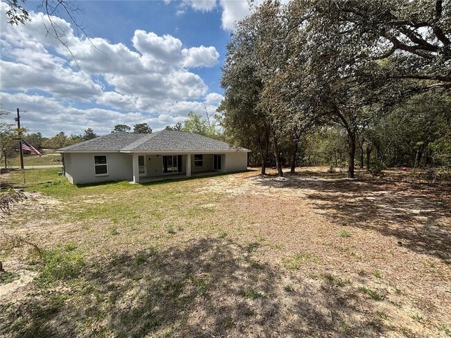 Building Photo - 6589 N Bedstrow Blvd