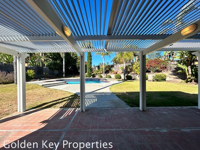 Building Photo - Welcome to this stunning 4-bedroom, 2.5-ba...