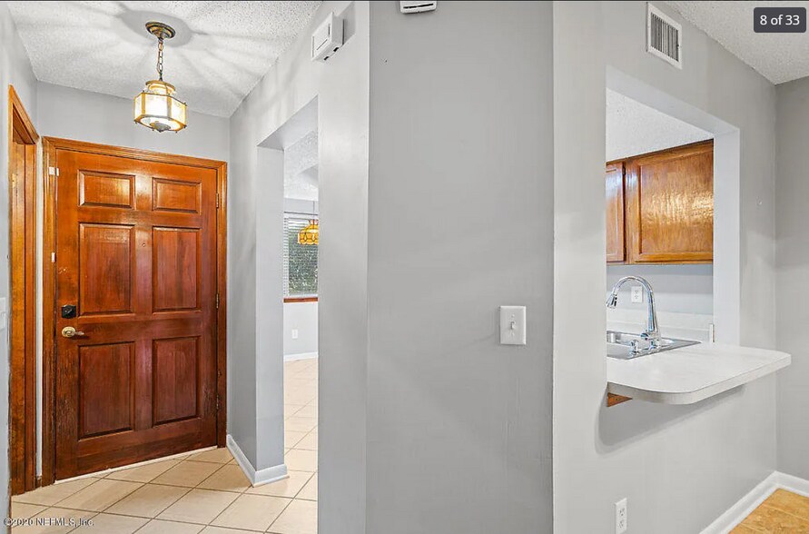 Building Photo - 11211 Windtree Dr