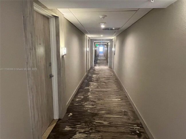 Building Photo - 10275 Collins Ave