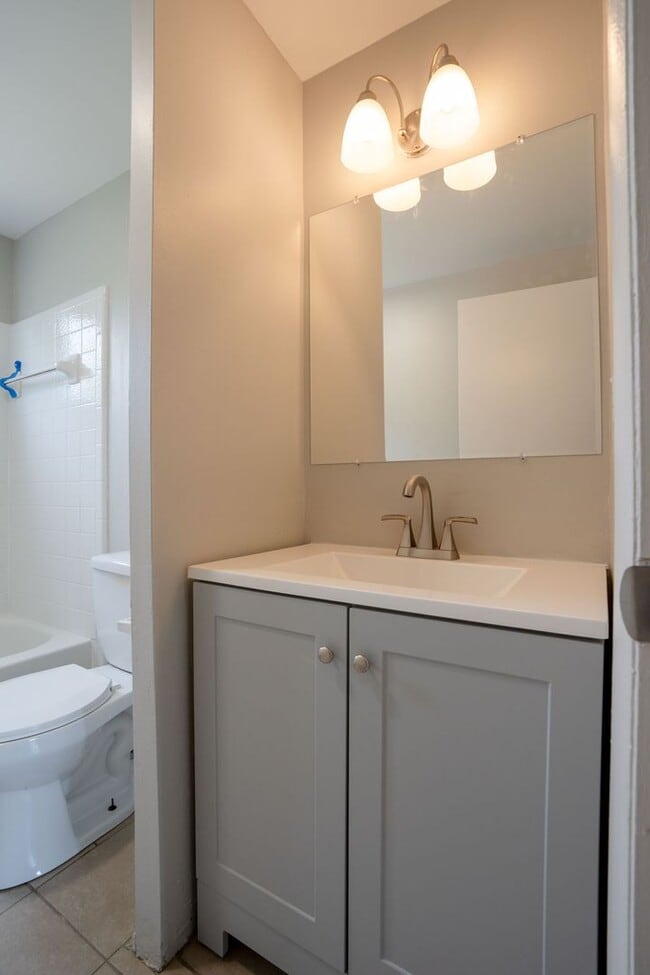 Building Photo - Must see FOUR bedroom Trilevel home