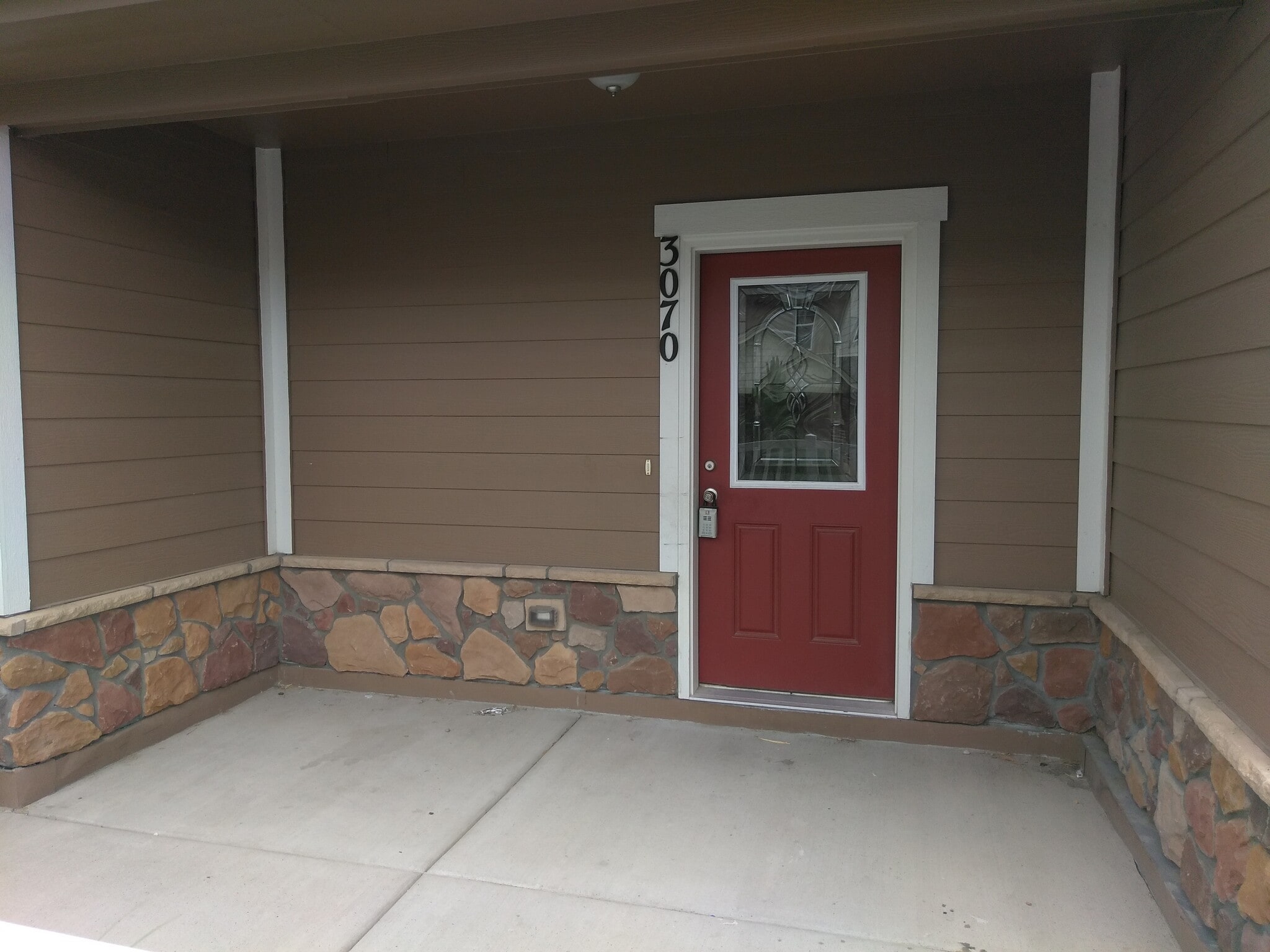 covered entry - 3070 Harpy Grove