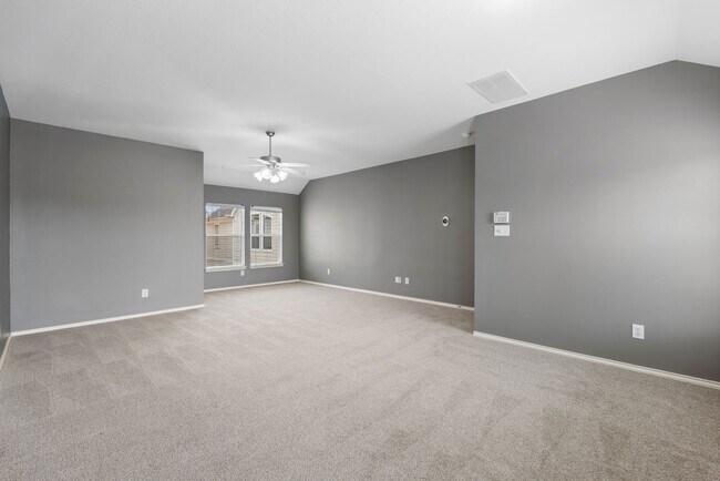 Building Photo - Come see this modern 3-story townhome in t...