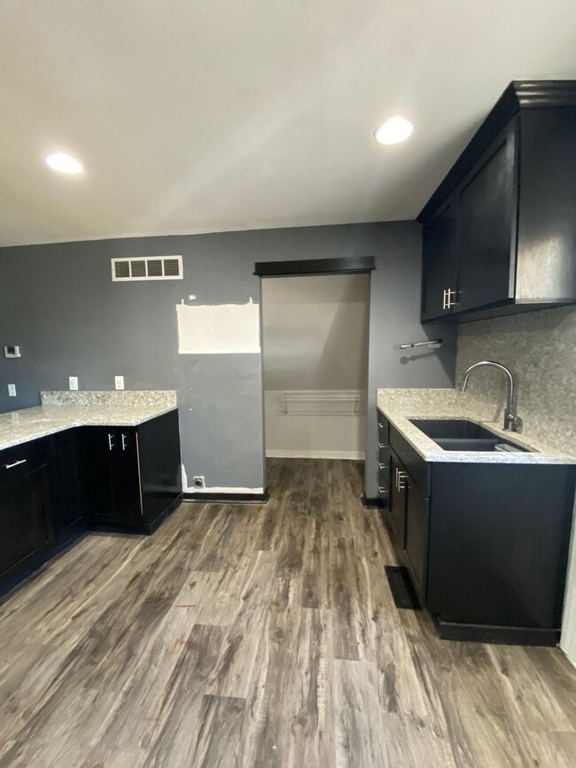 Building Photo - 1-Bedroom Home with 3-Stall Garage and Bonus Living Space