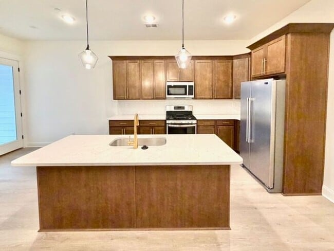 Building Photo - Now Leasing Brand New Townhomes In Olive Branch, Two Car Garage, Gated Community. Now Available.