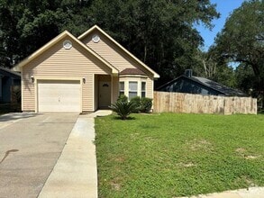 Building Photo - Charming 3/2 Home with Pet-Friendly Yard &...