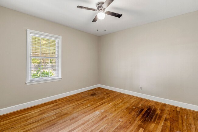 Building Photo - Large Renovated Ranch Home, Two Kitchens & Two Living Areas, Hardwood Flooring, Deck, Fenced!