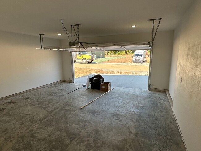 Building Photo - NEW 5 Bed 3 Bath w/ Walk Out Basement Waynesville School District