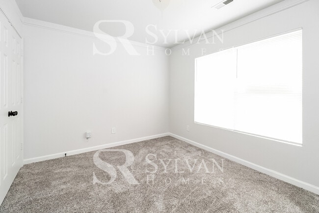 Building Photo - This adorable home is ready for your personal touch!