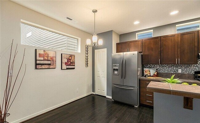 Building Photo - A Modern In-city Style with Comfort of the Suburbs Single Family Detached Condo