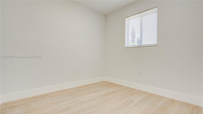 Building Photo - 3331 NW 8th Pl