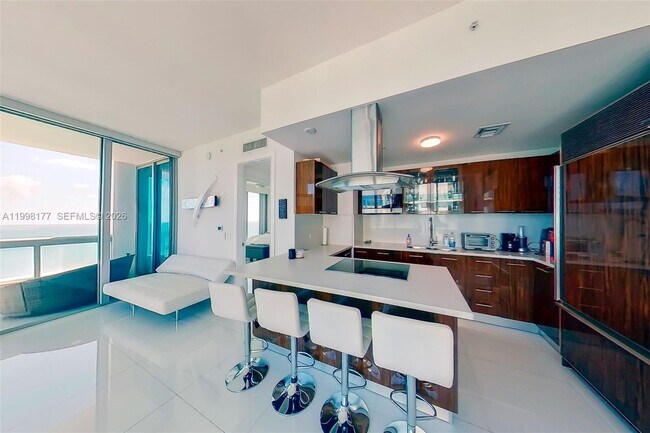 Building Photo - 6899 Collins Ave
