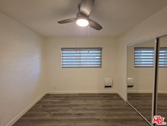 Building Photo - 10734 Palms Blvd