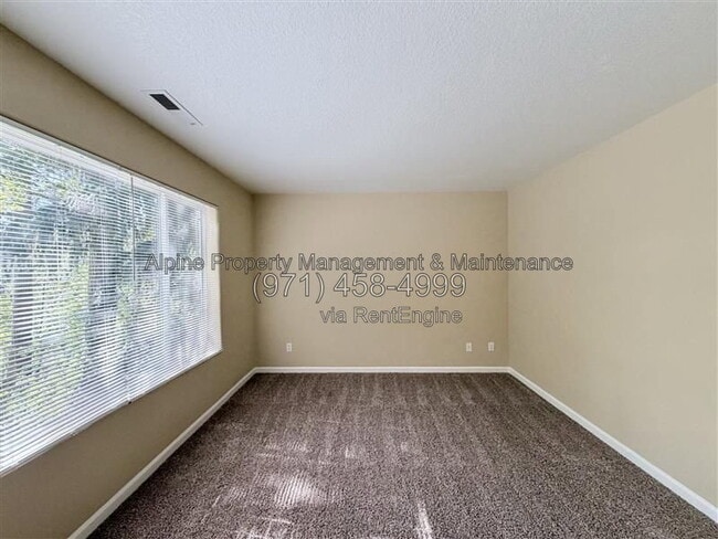 Building Photo - 5758 NE Damsel Dr